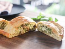 These calzones are a great way to use up leftover Thanksgiving turkey, but they&rsquo;re so delicious you&rsquo;ll be craving them year-round! As the calzones bake, the creamy ricotta, melty mozzarella and flavorful pesto blend together to create the perfect bite.