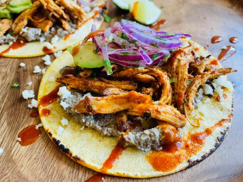 Carnitas-Style Chicken Tacos with Black Bean Puree and Pickled Red Onions