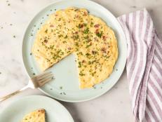 This is a riff on one of my favorite pasta dishes--spaghetti carbonara--which is basically just bacon and eggs with pasta. In this version, I play with the ratio of pasta to eggs. In the traditional dish, the balance is heavier on the pasta and lighter on the eggs. I flip this around and go to the other extreme: more eggs and only a little pasta. Toss the whole shootin' match in a nonstick pan, slide the pan into the oven, and voila! Carbonara is definitely what's for breakfast!