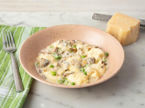 Ricotta Gnudi and Butter Sauce with English Peas and Mushrooms