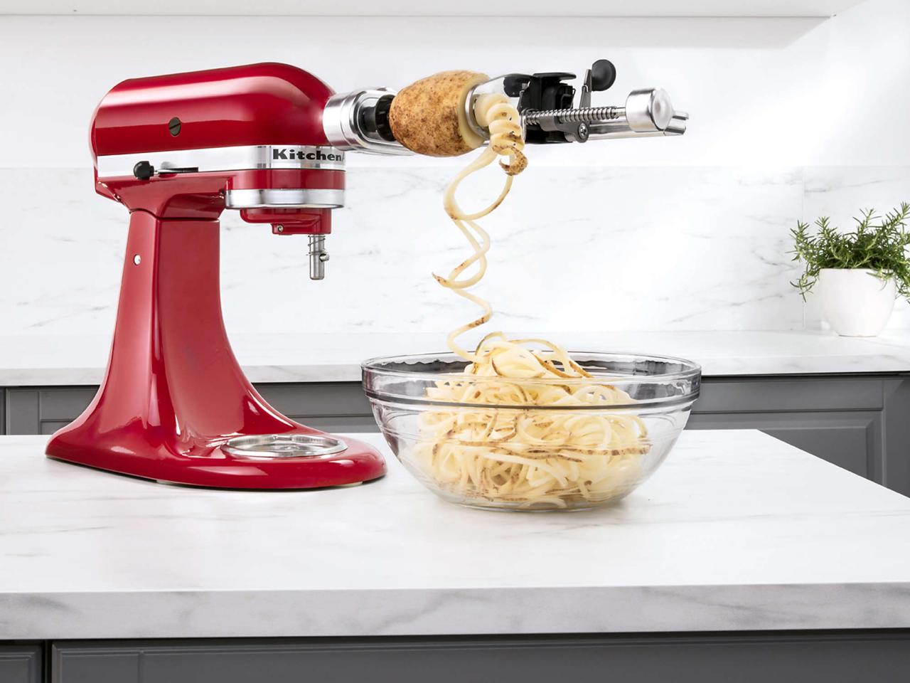 https://food.fnr.sndimg.com/content/dam/images/food/products/2019/12/11/rx_kitchenaid-5-blade-spiralizer-with-peel-core-and-slice-stand-mixer-attachment.jpeg.rend.hgtvcom.1280.960.suffix/1576093228574.jpeg