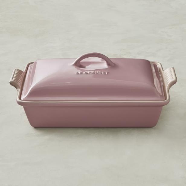 https://food.fnr.sndimg.com/content/dam/images/food/products/2019/2/27/rx_le-creuset-stoneware-covered-rectangular-casserole-12-12-rose.jpeg.rend.hgtvcom.616.616.suffix/1551298154133.jpeg