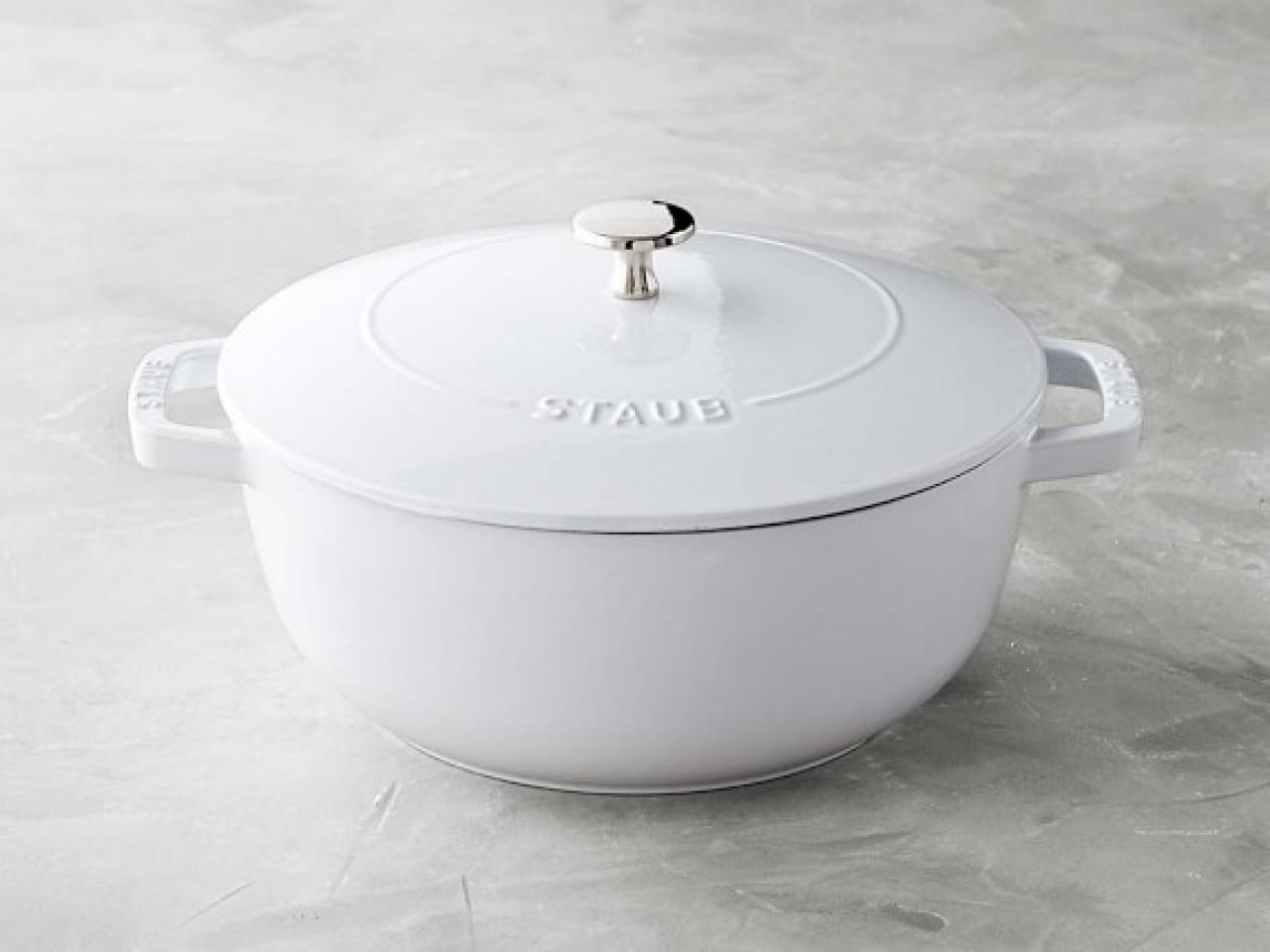 https://food.fnr.sndimg.com/content/dam/images/food/products/2019/4/25/rx_staub-cast-iron-essential-oven-3-34-qt-white.jpeg.rend.hgtvcom.1280.960.suffix/1556204821539.jpeg