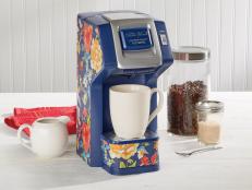 Brew your favorite coffee pod or grounds in this single-serve machine!