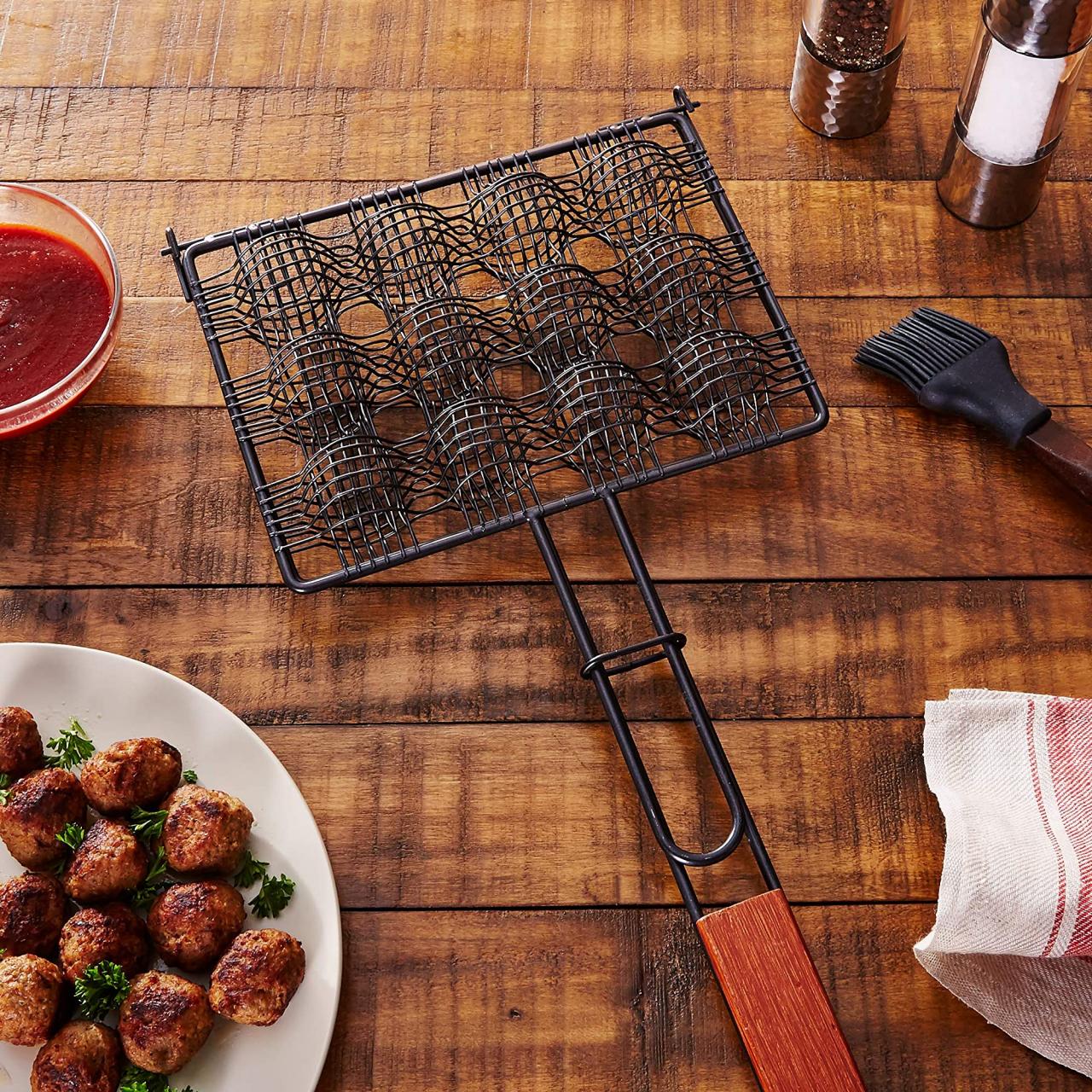 https://food.fnr.sndimg.com/content/dam/images/food/products/2020/6/5/rx_non-stick-meatball-basket.jpeg.rend.hgtvcom.1280.1280.suffix/1591383504280.jpeg