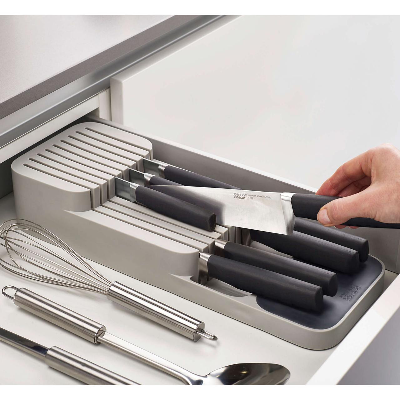 https://food.fnr.sndimg.com/content/dam/images/food/products/2021/1/5/rx_joseph-joseph-drawerstore-2-tier-compact-knife-organizer-in-grey.jpeg.rend.hgtvcom.1280.1280.suffix/1609867011775.jpeg