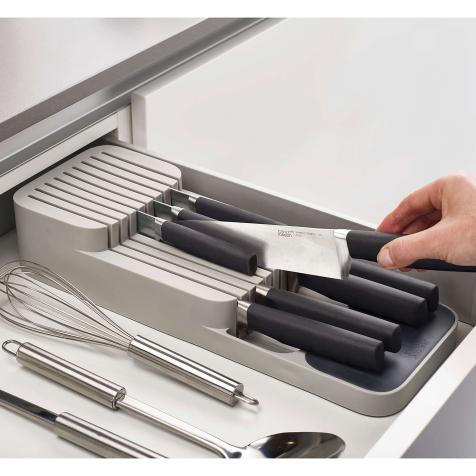 https://food.fnr.sndimg.com/content/dam/images/food/products/2021/1/5/rx_joseph-joseph-drawerstore-2-tier-compact-knife-organizer-in-grey.jpeg.rend.hgtvcom.476.476.suffix/1609867011775.jpeg