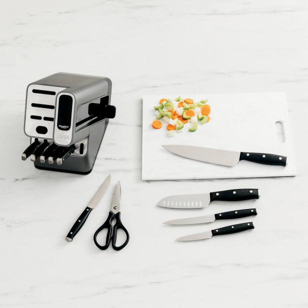 https://food.fnr.sndimg.com/content/dam/images/food/products/2021/11/29/rx_ninja-foodi-neverdull-essential-12pc-knife-system-with-built-in-sharpener---k12012.jpeg.rend.hgtvcom.616.616.suffix/1638192153450.jpeg