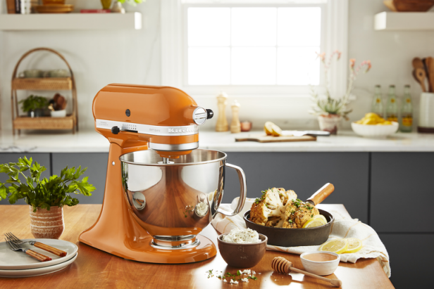 https://food.fnr.sndimg.com/content/dam/images/food/products/2021/2/10/rx_kitchenaid-stand-mixer-honey.png.rend.hgtvcom.616.411.suffix/1612989677412.png