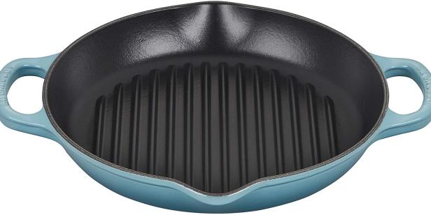 https://food.fnr.sndimg.com/content/dam/images/food/products/2021/2/22/rx_le-creuset-enameled-signature-deep-round-grill.jpeg.rend.hgtvcom.616.308.suffix/1614027999929.jpeg