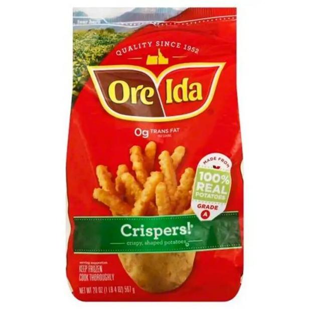 bags of Ore Ida brand frozen french fries in the freezer section