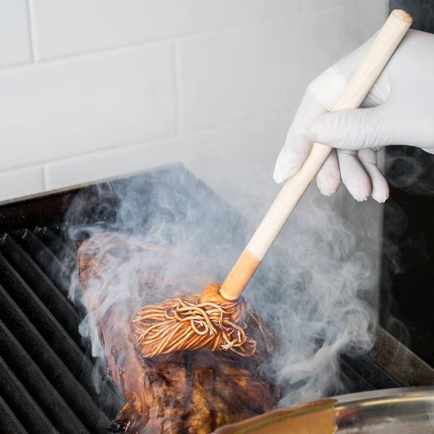 https://food.fnr.sndimg.com/content/dam/images/food/products/2021/5/11/rx_rocky-mountain-goods-basting-barbecue-mop.jpeg.rend.hgtvcom.616.616.suffix/1620761264793.jpeg