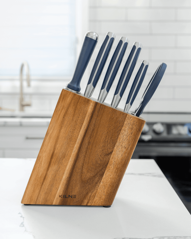 https://food.fnr.sndimg.com/content/dam/images/food/products/2022/10/28/rx_the-knife-set.png.rend.hgtvcom.616.770.suffix/1666963849838.png