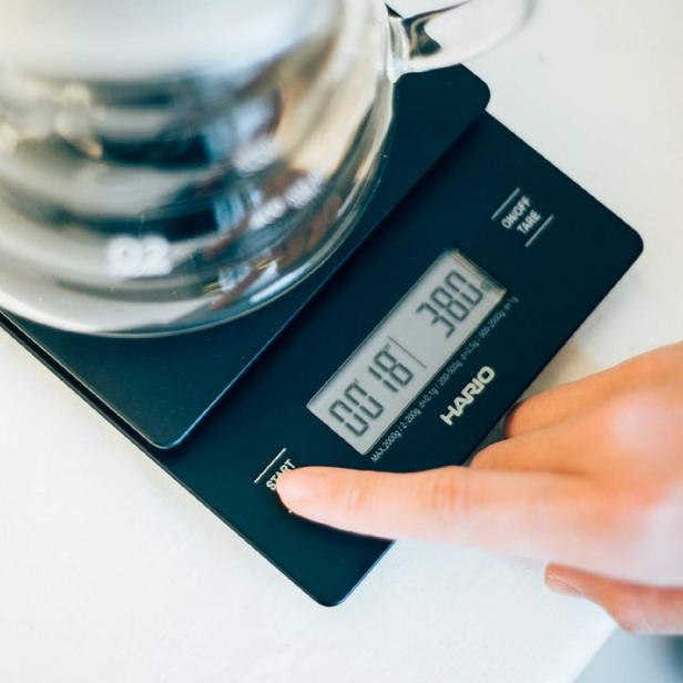 https://food.fnr.sndimg.com/content/dam/images/food/products/2022/11/3/rx_hario-v60-drip-coffee-scale.jpeg.rend.hgtvcom.616.616.suffix/1667496678138.jpeg