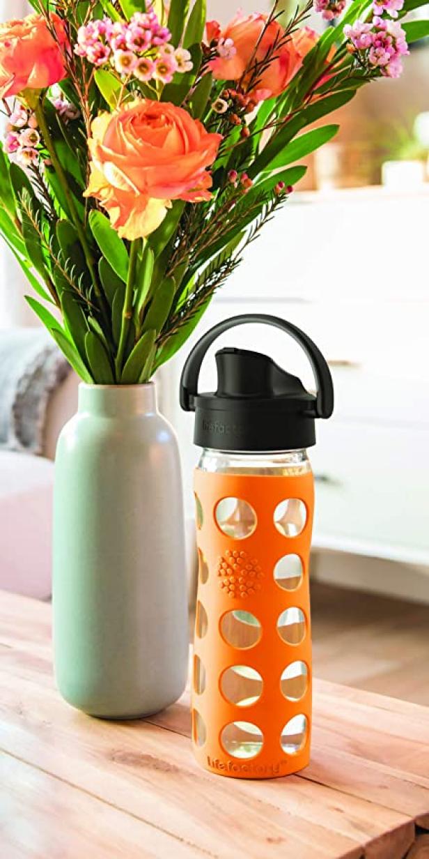https://food.fnr.sndimg.com/content/dam/images/food/products/2022/5/2/rx_lifefactory-16oz-water-bottle-with-silicone-sleeve-and-active-cap.jpeg.rend.hgtvcom.616.1232.suffix/1651505293873.jpeg