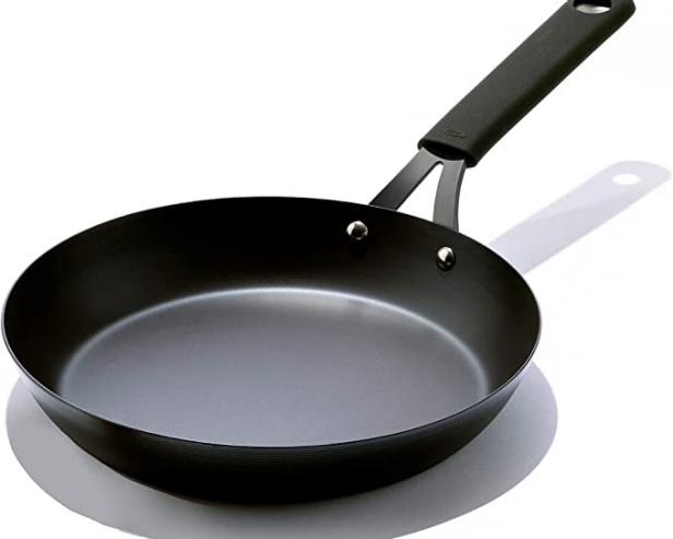 https://food.fnr.sndimg.com/content/dam/images/food/products/2022/8/19/rx_oxo-obsidian-pre-seasoned-carbon-steel-skillet.jpeg.rend.hgtvcom.616.493.suffix/1660935840883.jpeg