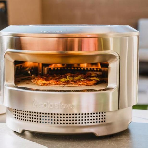 https://food.fnr.sndimg.com/content/dam/images/food/products/2023/10/11/rx_solostove_solo-stove-pi-pizza-oven.jpeg.rend.hgtvcom.616.616.suffix/1697049547281.jpeg
