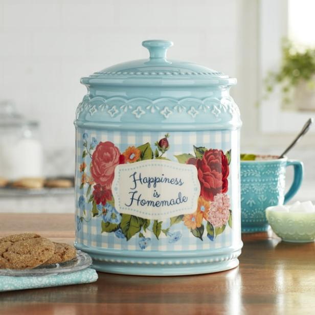 https://food.fnr.sndimg.com/content/dam/images/food/products/2023/10/23/rx_walmart_the-pioneer-woman-happiness-is-homemade-stoneware-cookie-jar.jpeg.rend.hgtvcom.616.616.suffix/1698093883707.jpeg