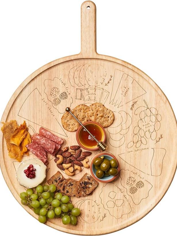 https://food.fnr.sndimg.com/content/dam/images/food/products/2023/11/1/rx_sophistiplate-maple-leaf-at-home-x-meg-quinn-charcuterie-map-board.jpeg.rend.hgtvcom.616.822.suffix/1698844098229.jpeg