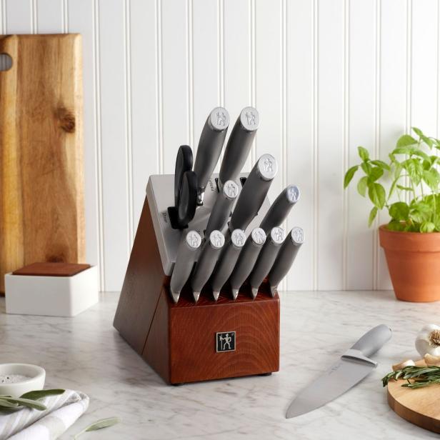 https://food.fnr.sndimg.com/content/dam/images/food/products/2023/11/8/rx_target_henckels-modernist-14-pc-self-sharpening-knife-set-with-block.jpeg.rend.hgtvcom.616.616.suffix/1699457829723.jpeg