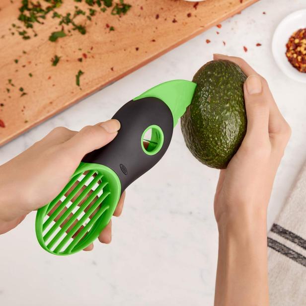 https://food.fnr.sndimg.com/content/dam/images/food/products/2023/12/10/rx_amazon_oxo-good-grips-3-in-1-avocado-slicer.jpeg.rend.hgtvcom.616.616.suffix/1702245152237.jpeg