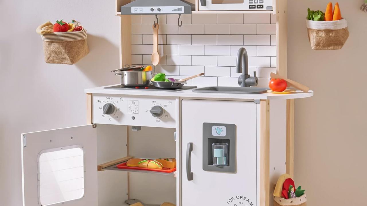 https://food.fnr.sndimg.com/content/dam/images/food/products/2023/12/18/rx_amazon_tiny-land-wooden-play-kitchen.jpeg.rend.hgtvcom.1280.720.suffix/1702946737954.jpeg