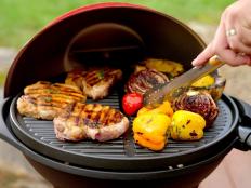 This portable electric grill converts from tabletop to freestanding in seconds, but can it compete with your faithful old charcoal grill? I put it to the test to find out.