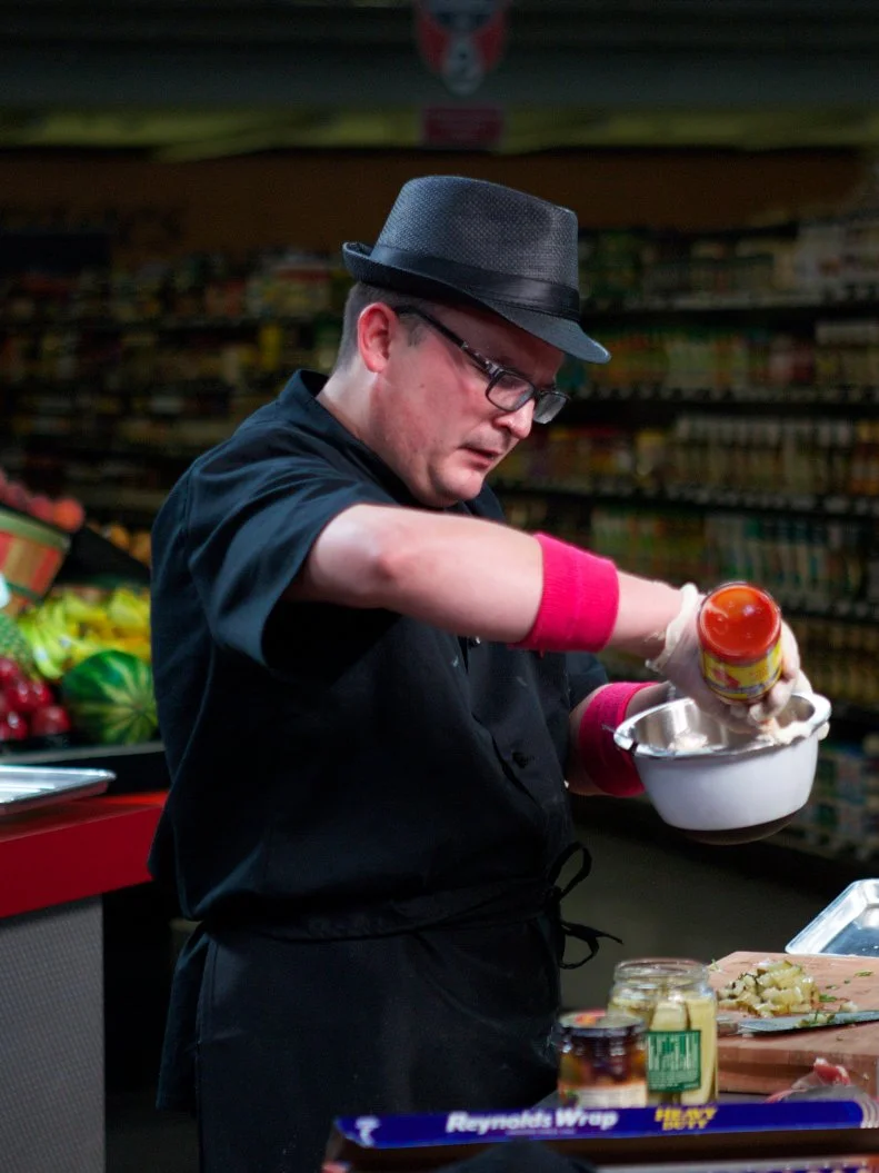 Chef Daniel Vercher during the cooking part of Game 2, Closing Time, Ultimate Hot Dog, 2 min shopping and 30 min cooking time, as seen on Food Network's Guy's Grocery Games, Season 1.