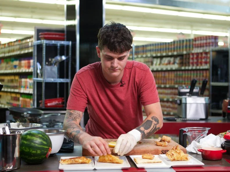 Chef Jay Kean during the cooking part of Game 1, Out of Stock, Taco Night, No taco shells, tortillas, seasoning, and ground beef, 30 min cooking time, as seen on Food Network's Guy's Grocery Games, Season 1.