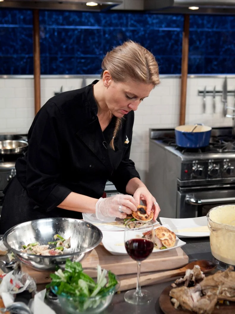 Chopped: After Hours chef Amanda Freitag  working on her entree that must include: deep dish pizza dough, rabbit escabeche, swiss chard and pineapple cheese spread, as seen on Food Network's Chopped: After Hours.