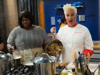 Worst Cooks host/Red team leader Chef Anne Burrell reacts to recruit Genique Freeman's destruction of a pot while working on her "signature dish" to present to Chef Tyler and Chef Anne before they pick teams, as seen on Food Network's Worst Cooks in America, Season 6.