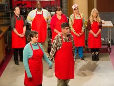 Red Team members, Christina and David, during elimination, as seen on Food Networkâ  s Worst Cooks in America, Season 6.