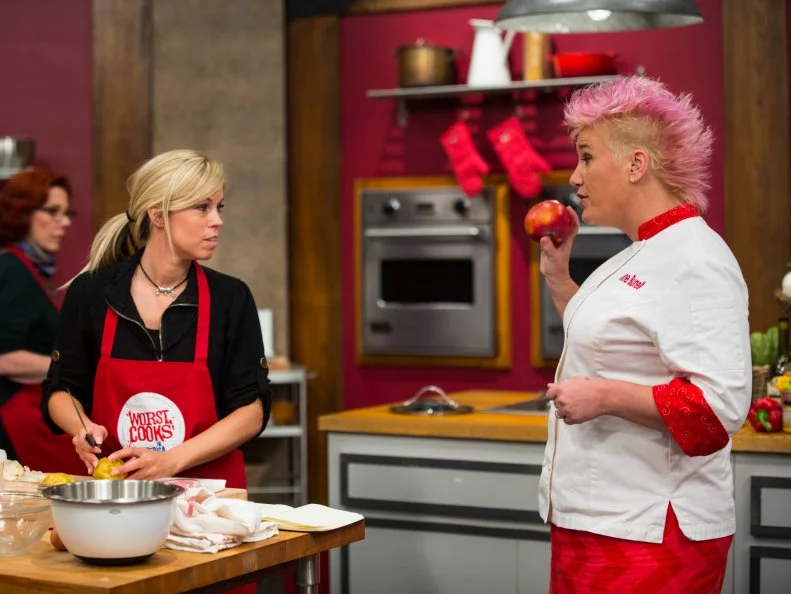 Chef Anne Burrell speaks with Carie Pullano-Keller during the Roulade Challenge as seen on Food Network's Worst Cooks in America, Season 5.