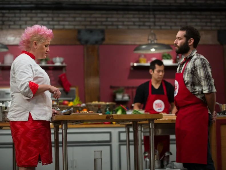 Anne Burrell speaks with one of her contestants Mike Glazer as seen on Food Network's Worst Cooks in America, Season 5.