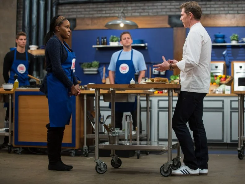 Stephanie St. Aubin presents her dish to Chef Bobby Flay during the Roulade Challenge as seen on Food Network's Worst Cooks in America, Season 5.