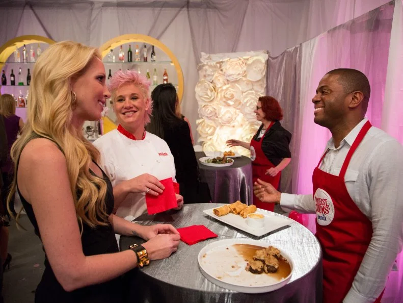 Red Team Leader Chef Anne Burrell and Lulu Johnson stop by to taste Red Team member Jamie Thomas hors d'oeuvre, for the Surprise Party Challenge. The Red Team had to replicate Red Team Leader Chef Anne Burrell's Chicken & Broccoli Rabe Summer Rolls and Sausage-Stuffed Mushrooms  and infuse their dishes with their individual surprise candy flavors (Jamie's was basil), as seen on Food Network's Worst Cooks in America, Season 5.