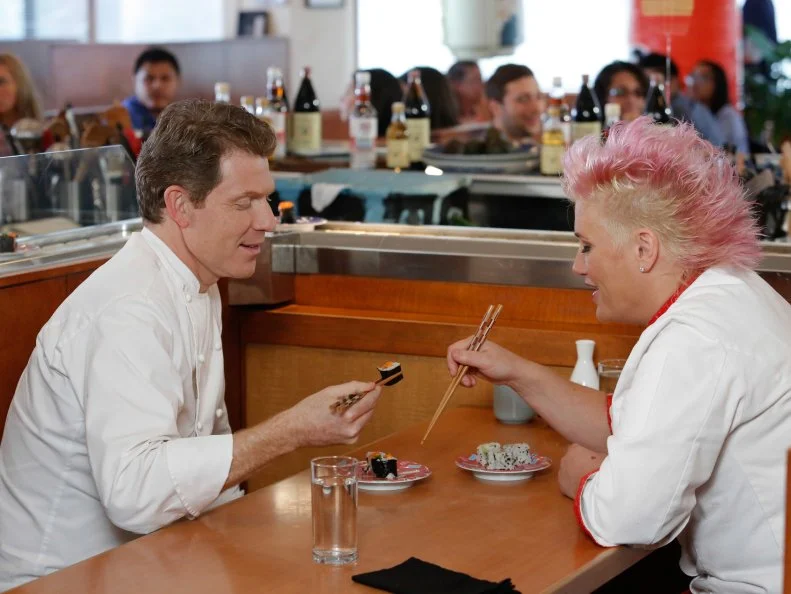 Chef Bobby Flay and Chef Anne Burrell judge the results of the two competing teams during the Sushi Skill Drill Challenge. The Red and Blue team recruits must prepare two sushi dishes for a hungry lunchtime crowd and are tested on both their time & quantity: A California Roll with snow crab, nori, rice on the outside, garnished with sesame seeds and a Salmon Roll with sliced salmon, scallion, sushi rice, spicy mayo (with nori on the outside.)  The diners will determine which team will win the challenge, as seen on Food Network's Worst Cooks in America, Season 5.