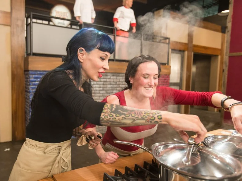 Cast Members Amber Brauner and Casey Pentony cook during a cooking challenge  as seen on Food Networkâ  s Worst Cooks in America, Season 5.