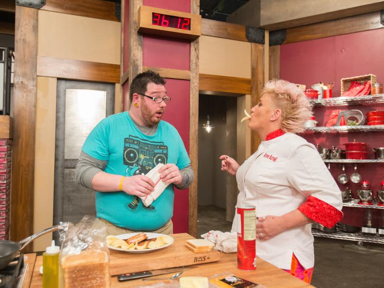 Cast Members Benji Brown is scolded by Anne Burrell  as seen on Food Networkâ  s Worst Cooks in America, Season 5.