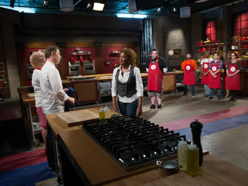 Anne Burrell and Bobby Flay Muneerah Warner during the first of the season as seen on Food Network's Worst Cooks in America, Season 5.