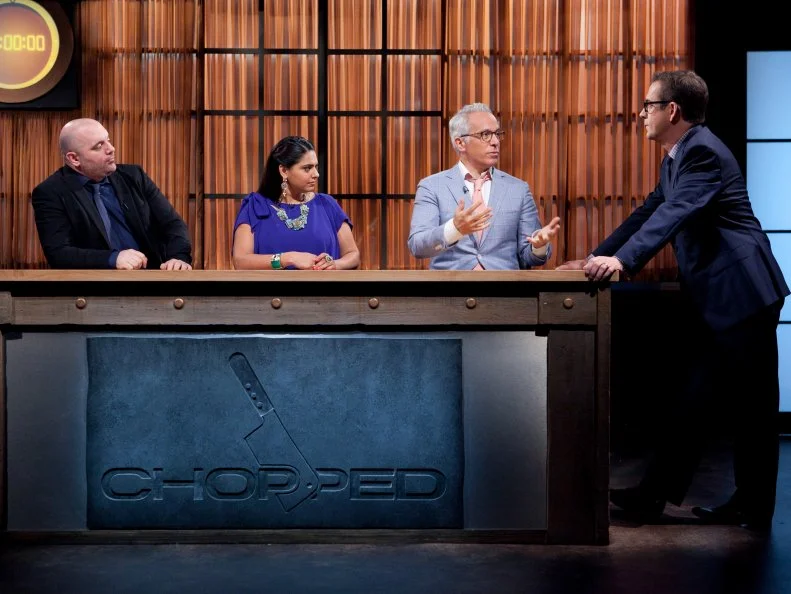 Chopped Host Ted Allen and judges: Geoffrey Zakarian, Maneet Chauhan and Chris Santos discuss the  appetizer cooking round, as seen on Food Networkâ  s Chopped, Season 19.
