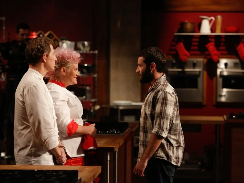 Red Team recruit Mike Glazer to Red Team Leader Chef Anne Burrell and, as Red Team recruit Jamie Thomas is by the chefs as the of the Feed the Family Challenge, as seen on Food Network's Worst Cooks in America, Season 5.