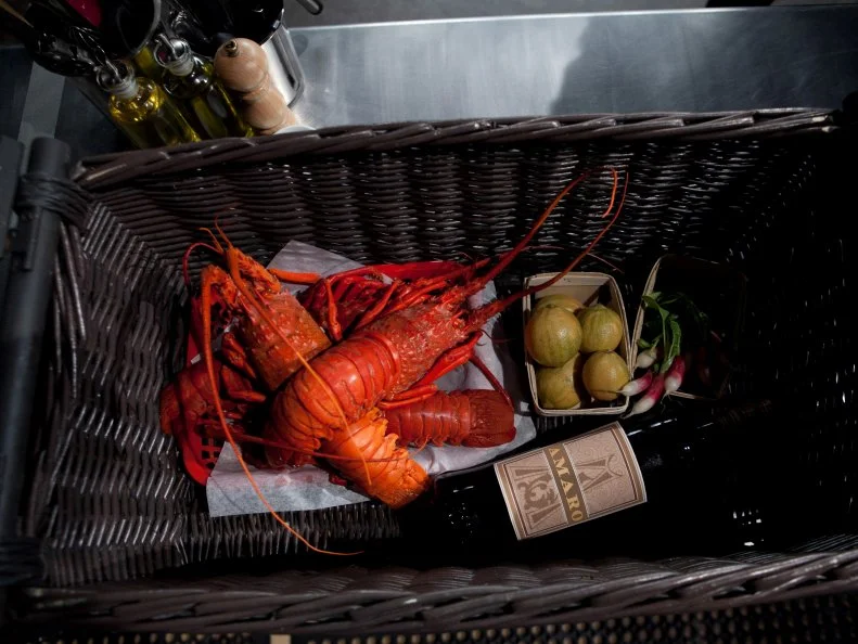 The mystery basket ingredients for the entree round are: spiny lobster, pink variegated lemons, amaro and radish, as seen on Food Networkâ  s Chopped, Season 19.