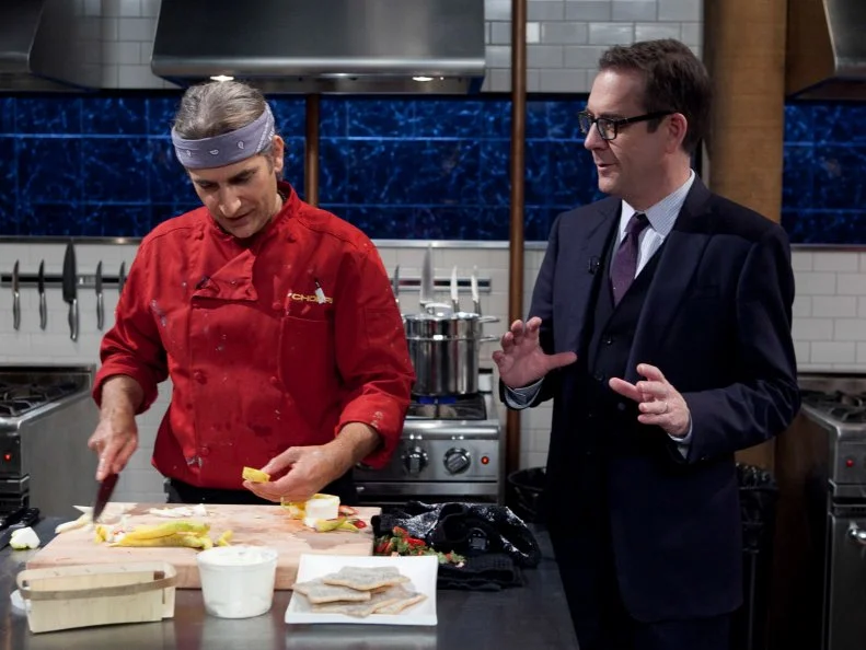 Chopped host Ted Allen checks in on celebrity Michael Imperioli while he works on his dessert that must include: star cookies, strawberries, mascarpone cheese and buddha's hand, as seen on Food Networkâ  s Chopped, Season 19.