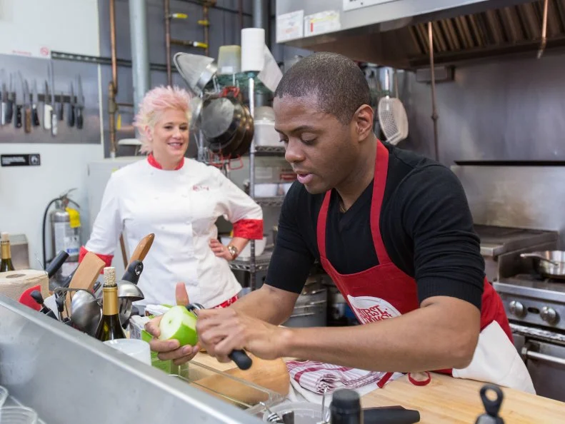 Chef Anne Burrell watches as finalist  Jamie Thomas cooks  for the final episode as seen on Food Network's Worst Cooks in America, Season 5.