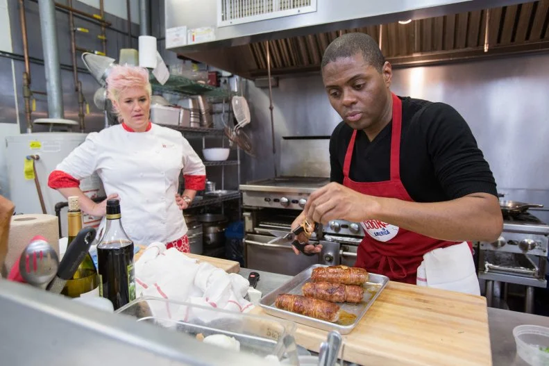 Chef Anne Burrell watches as finalist  Jamie Thomas cooks  for the final episode as seen on Food Network's Worst Cooks in America, Season 5.