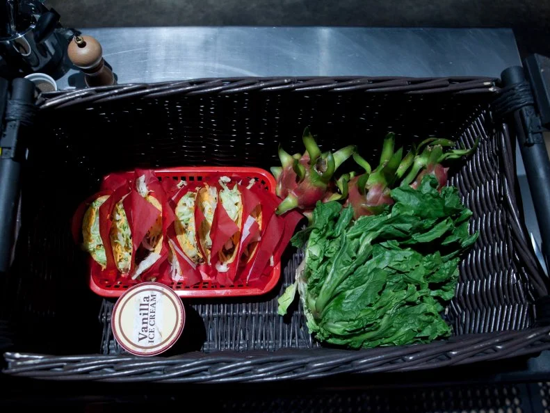 The mystery basket ingredients for the appetizer round are: 10 pack of tacos, escarole, dragon fruit and vanilla ice cream, as seen on Food Networkâ  s Chopped, Season 19.