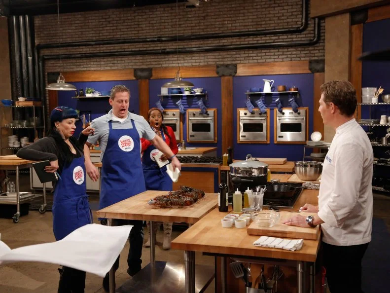 Chef Bobby Flay surprises his recruits with live lobsters which they will have to prepare as part of the Surf and Turf Challenge. For this challenge, each team must replicate surf and turf dishes demonstrated to them by their team leader; Grilled Ribeye with Fra Diavolo Lobster Relish by Chef Bobby Flay for the Blue Team, and Dry Rubbed Rib Eye with Chili Lobster by Chef Anne Burrell for her Red Team. The Blue Team recruits are:  Amber Brauner, Daniel Beyda and Stephanie St. Aubin, as seen on Food Network's Worst Cooks in America, Season 5.