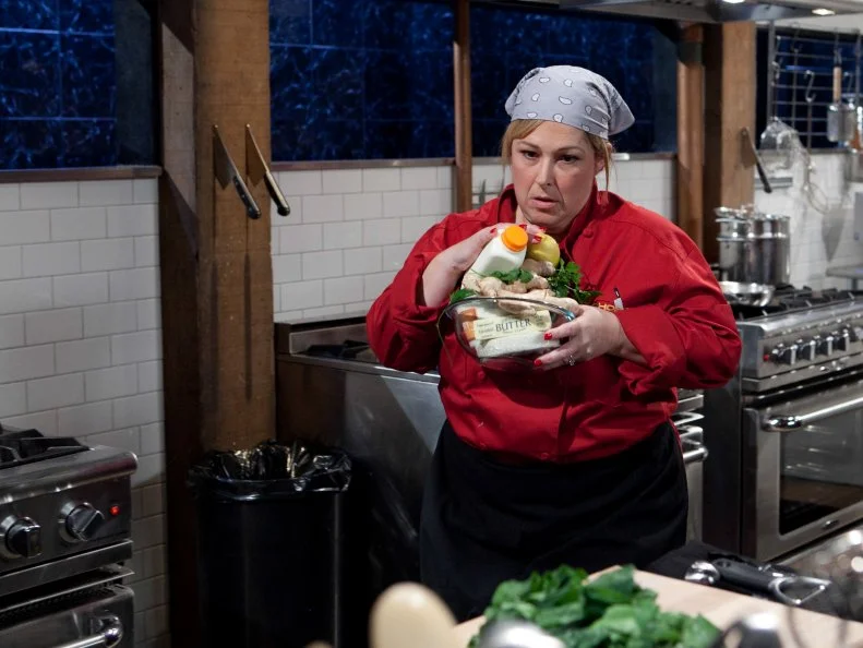 Celebrity Carnie Wilson working on her appetizer that must include: beef tongue, candies citron, Chinese broccoli and microwave chocolate cake, as seen on Food Networkâ  s Chopped, Season 19