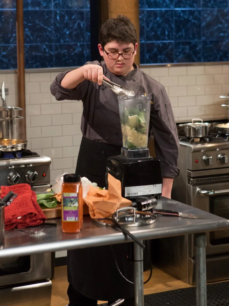 Teen competitor Eyan Goldman (16) works on his entree that must include: frogs legs, mafaldine, bok choy and lobster mushrooms, as seen on Food Network's Chopped, Season 21.